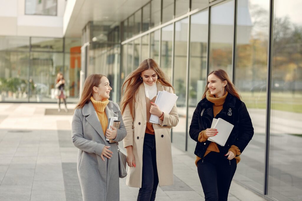 young women walking to class